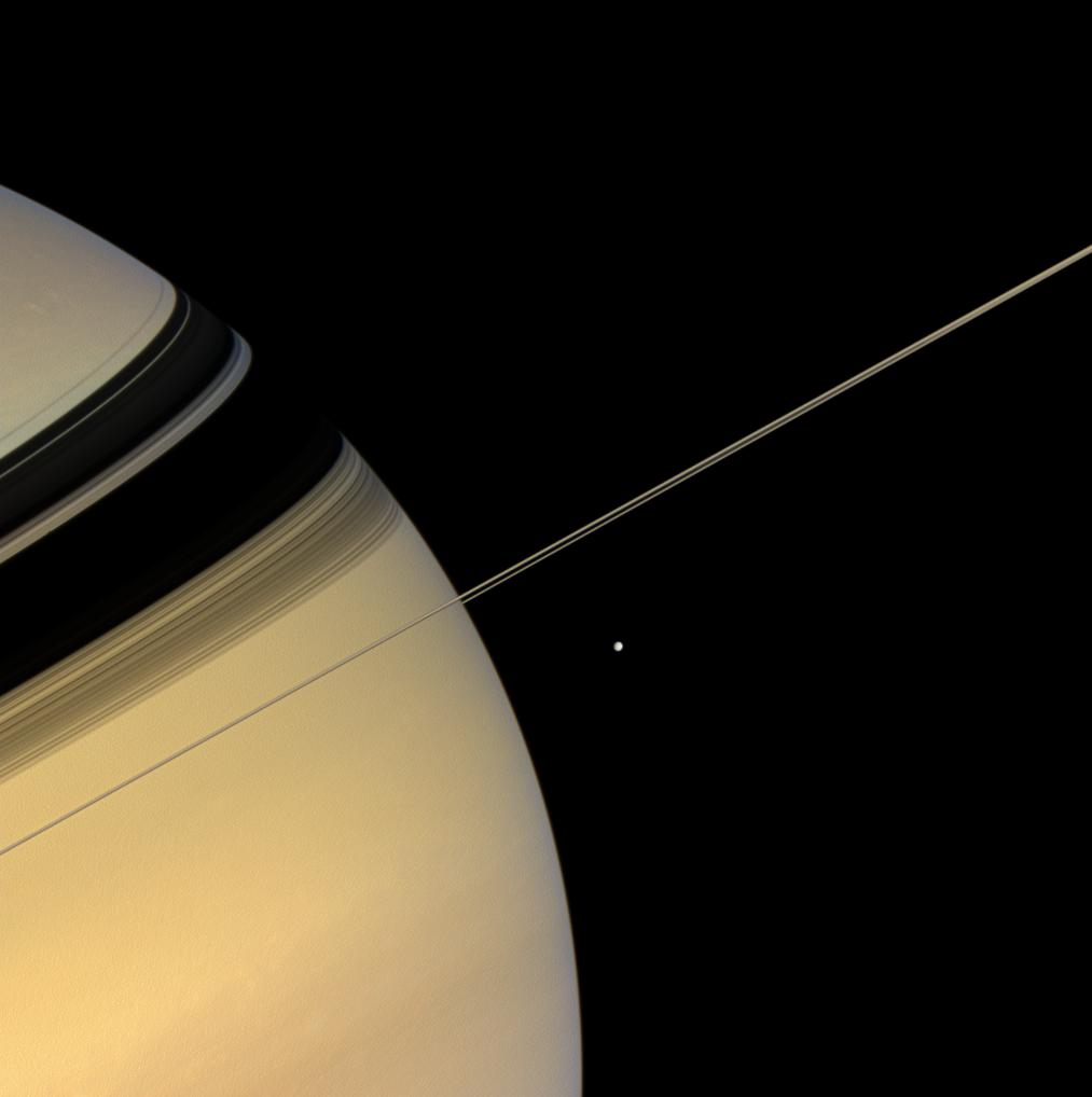 a sideview of saturn and its rings
